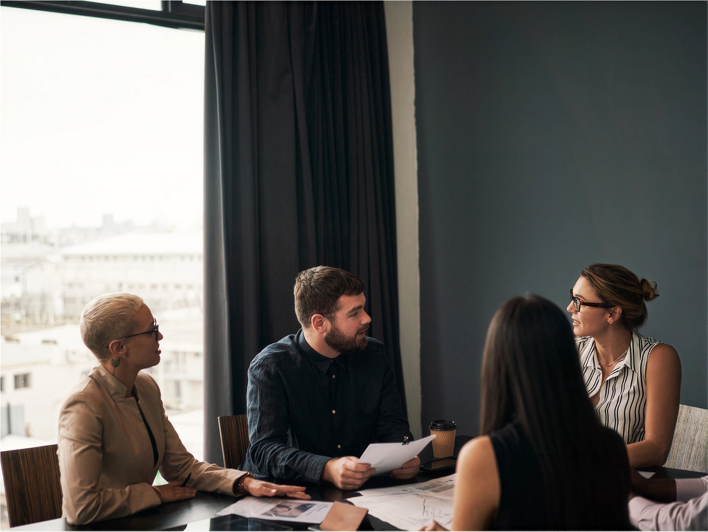 Talking a client through the plan in the boardroom