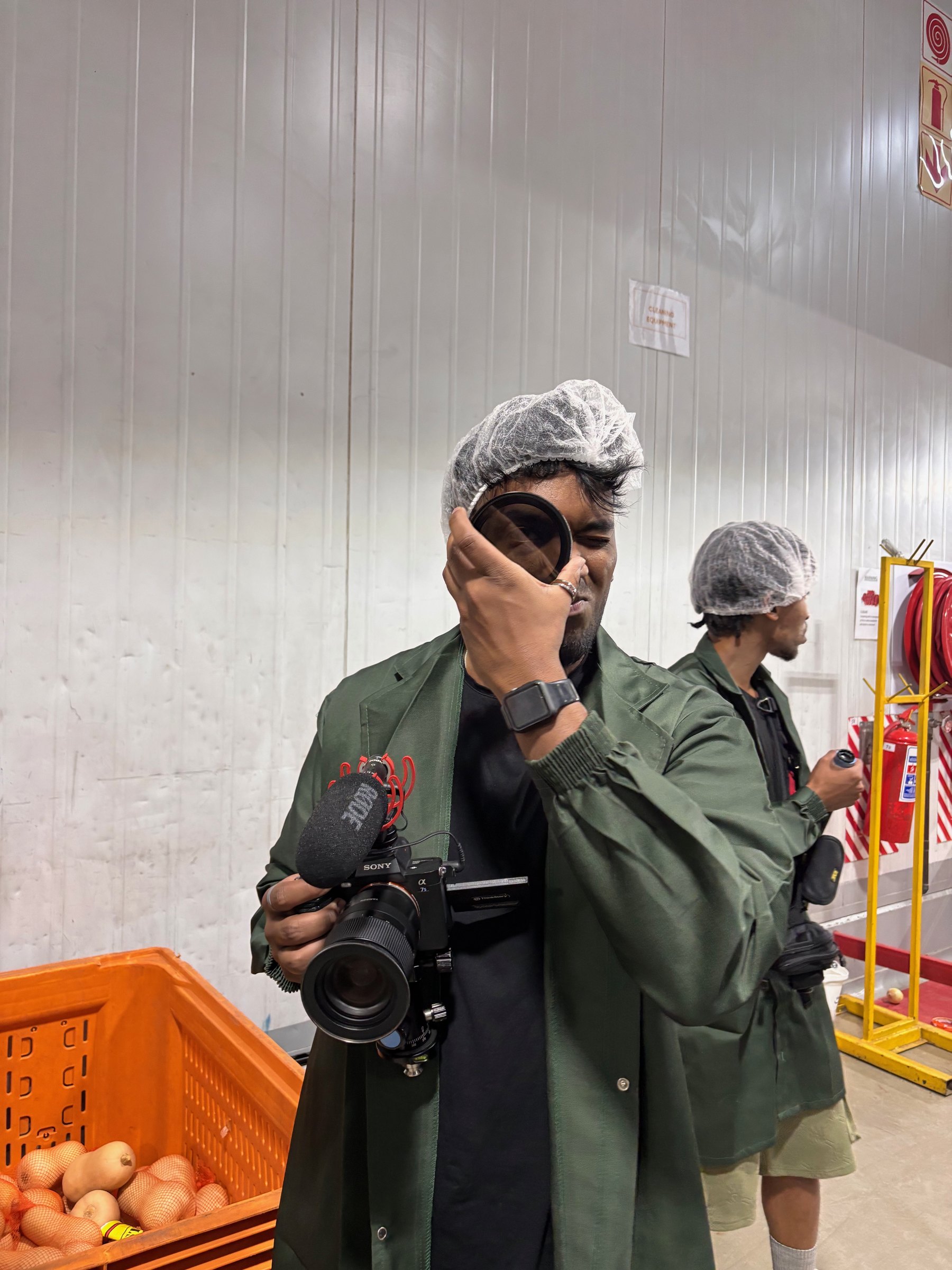 Checking a lens filter on a food production shoot