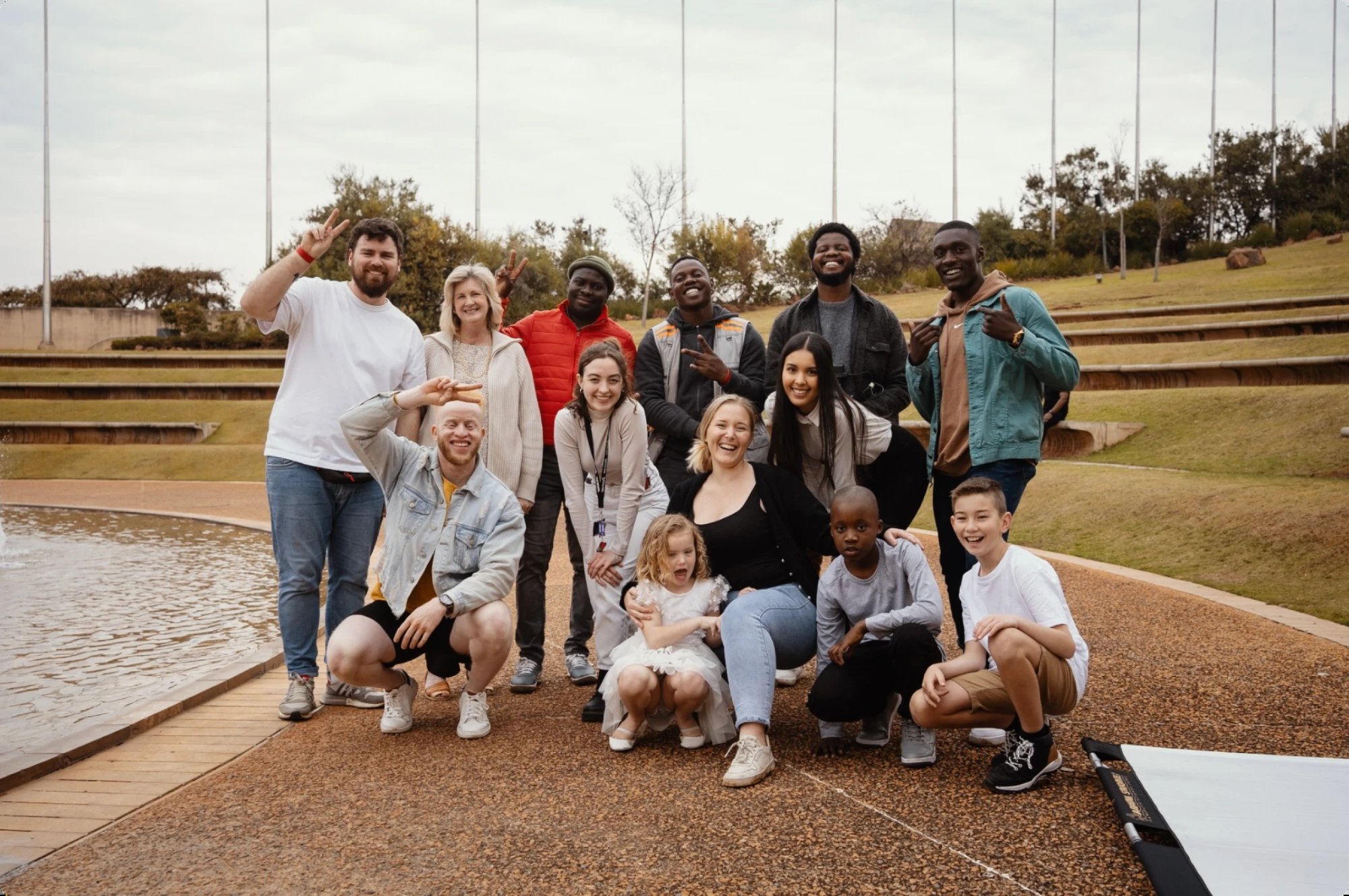 The whole team and their families together on location