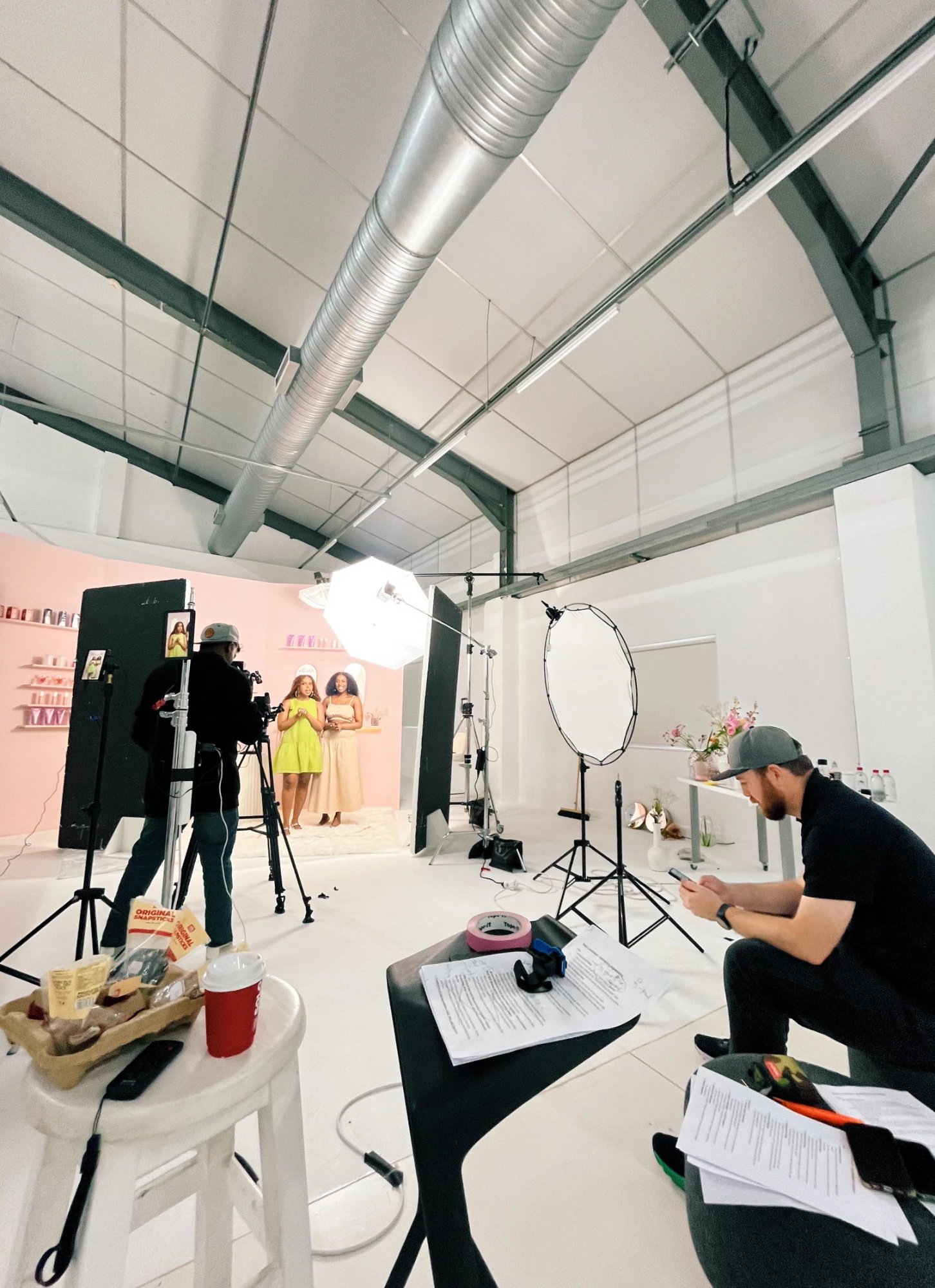 Rolling on the pink cyc for a beauty shoot