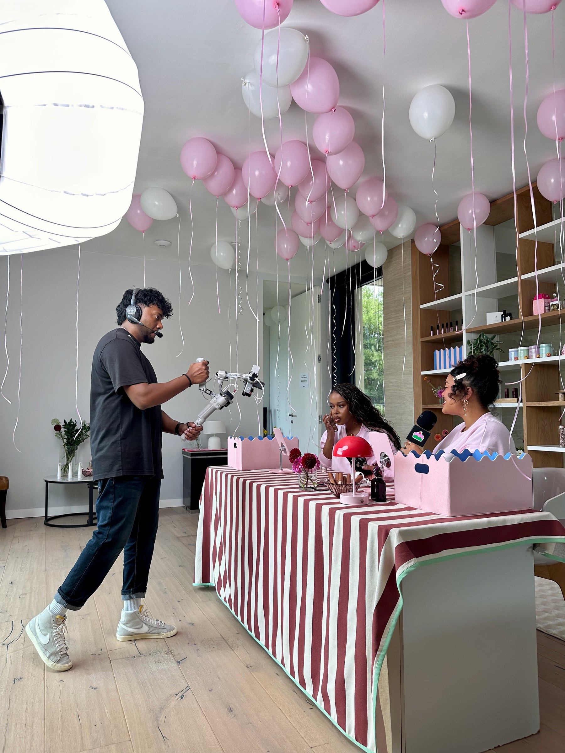 Filming the Bash live stream under the balloons