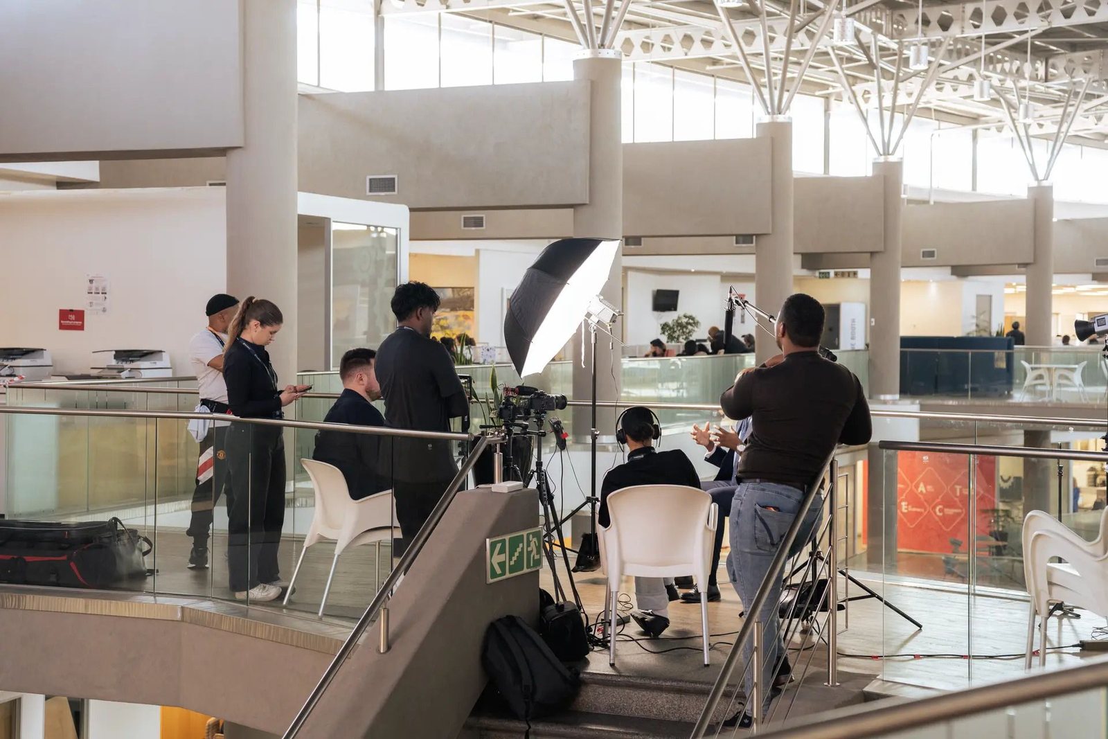 The ThinkStory crew filming a client testimonial interview on location