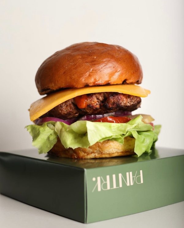 A Pantry cheeseburger on its box