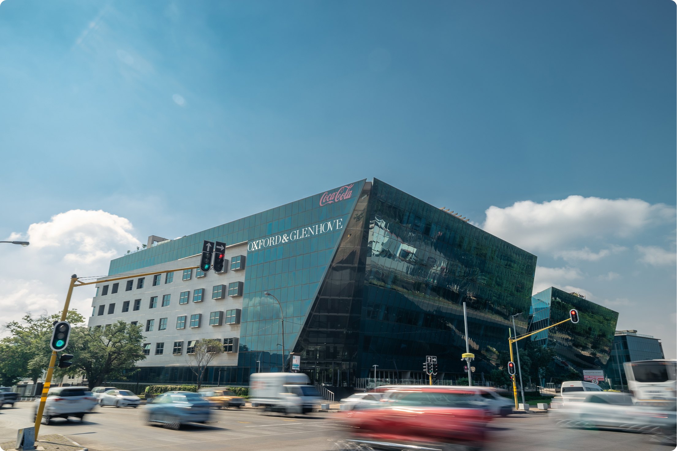The building with the city moving past