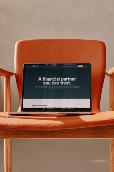 Orca Consult website laptop mockup homepage