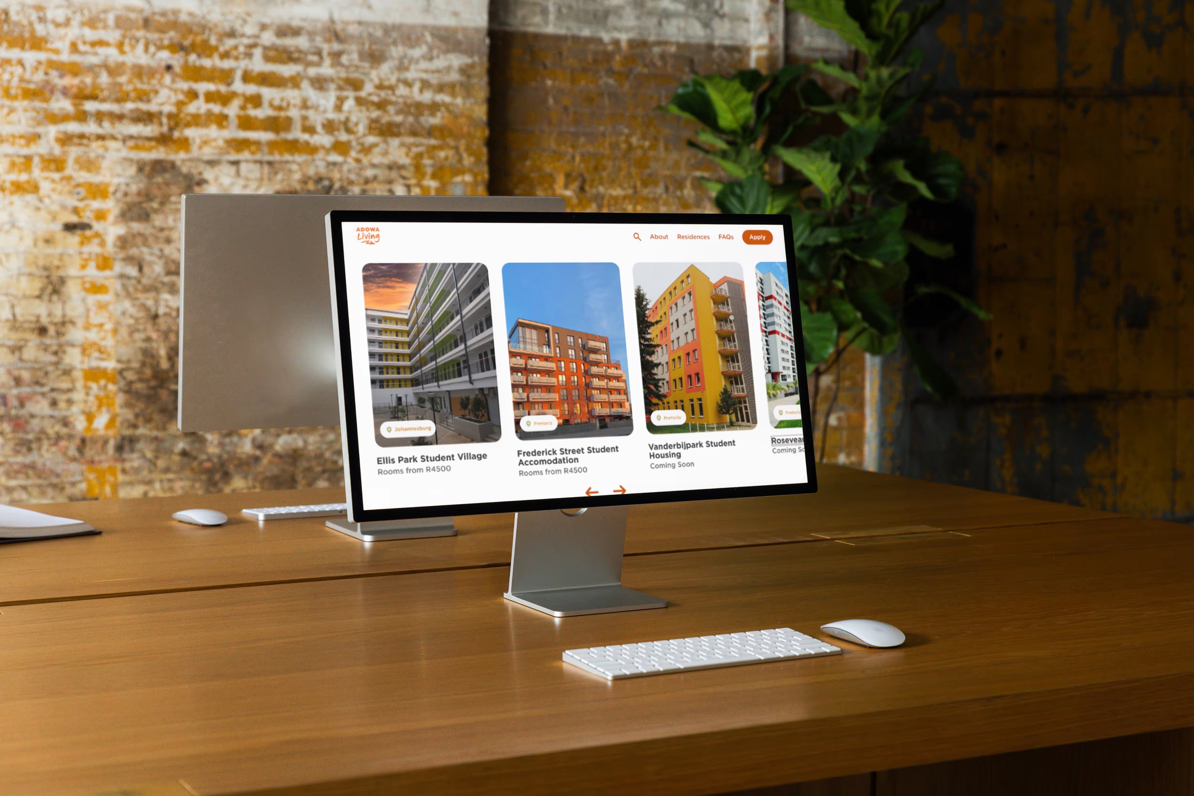 ADOWA property listings on the studio display