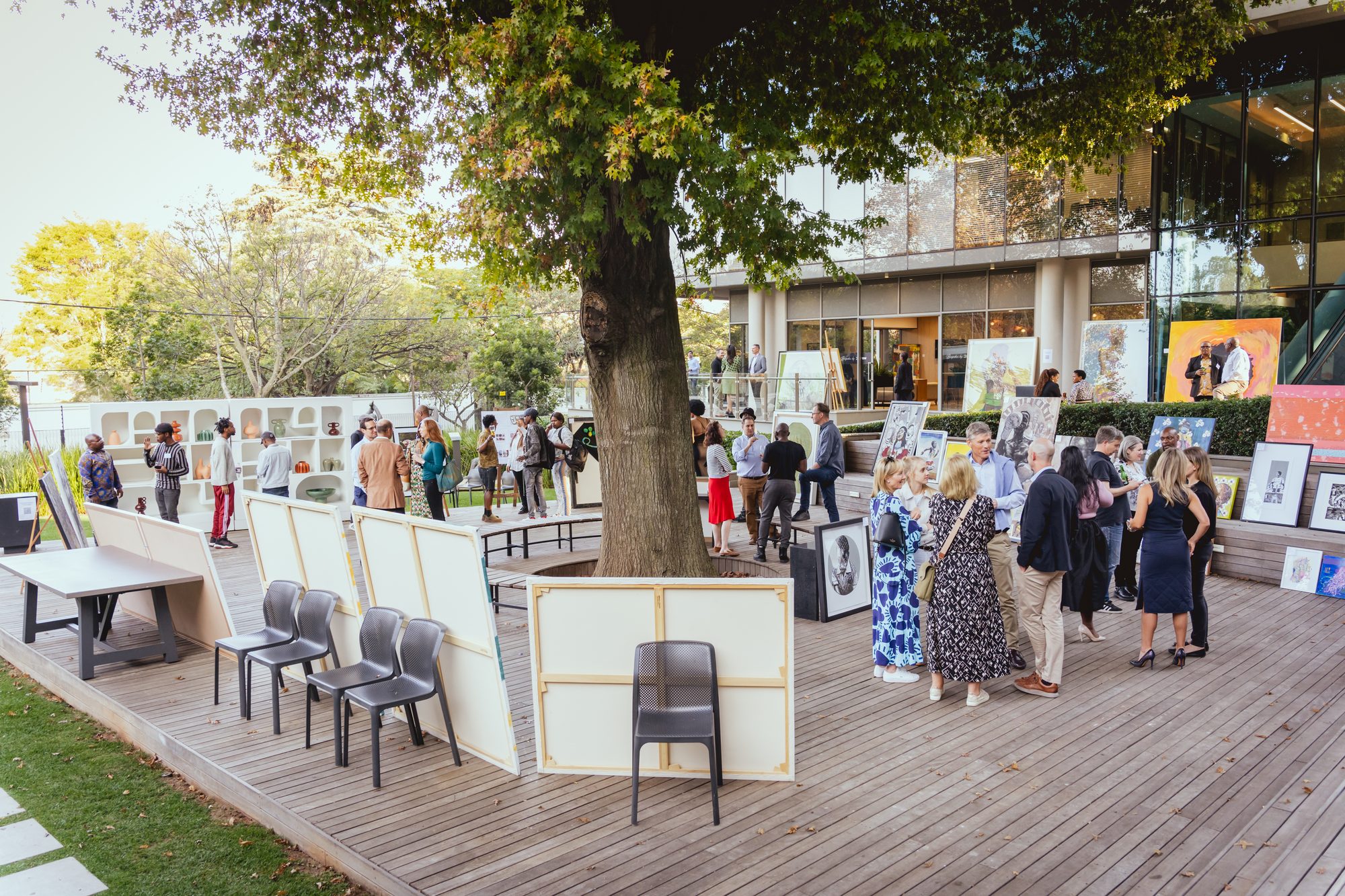 A busy evening at the Barrow art event under the oak tree