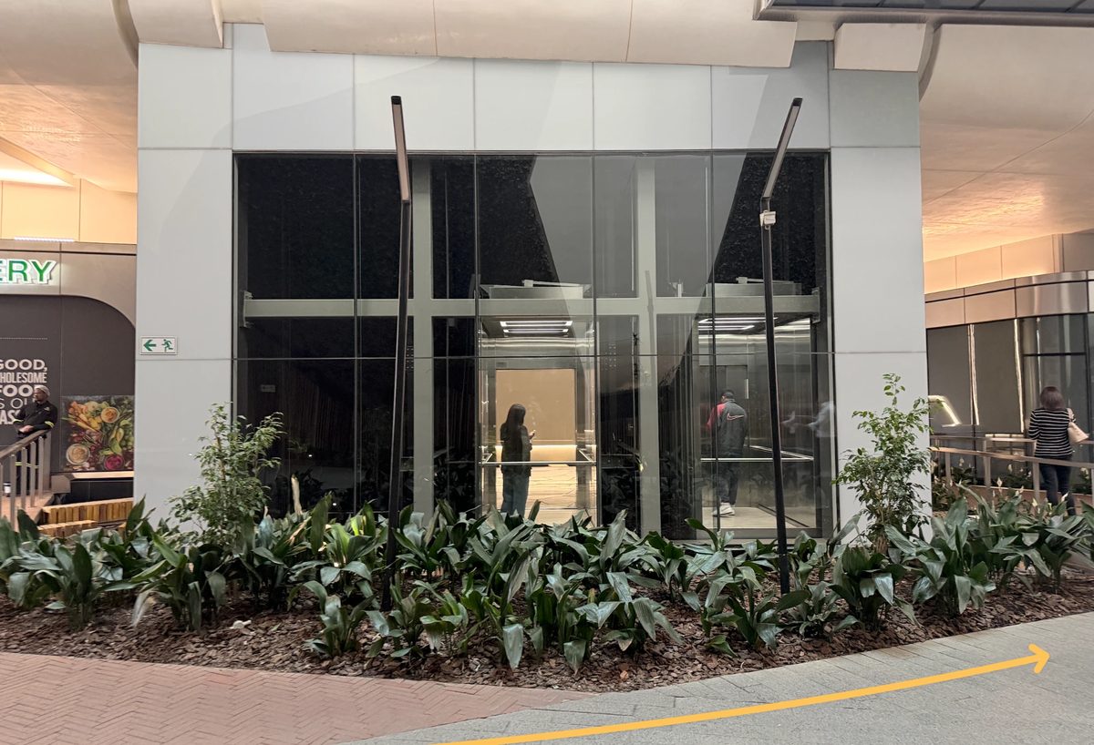The glass elevator shaft in the centre of the Link Building