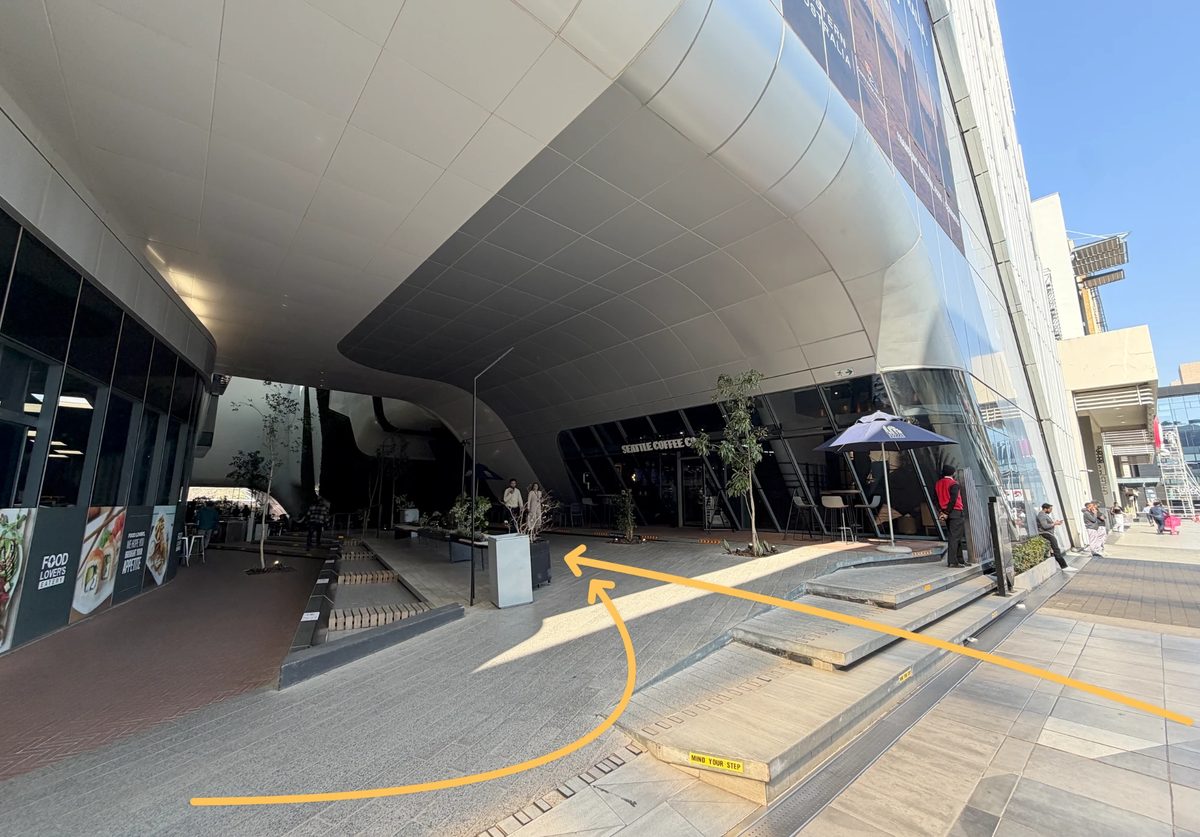 Seattle Coffee Co under the silver canopy at The Link, next to Food Lover's